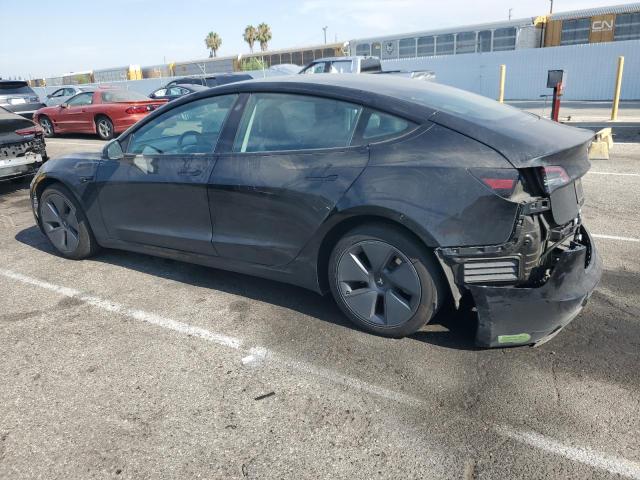 5YJ3E1EA0PF432217 - 2023 TESLA MODEL 3 Schwarz Foto 2