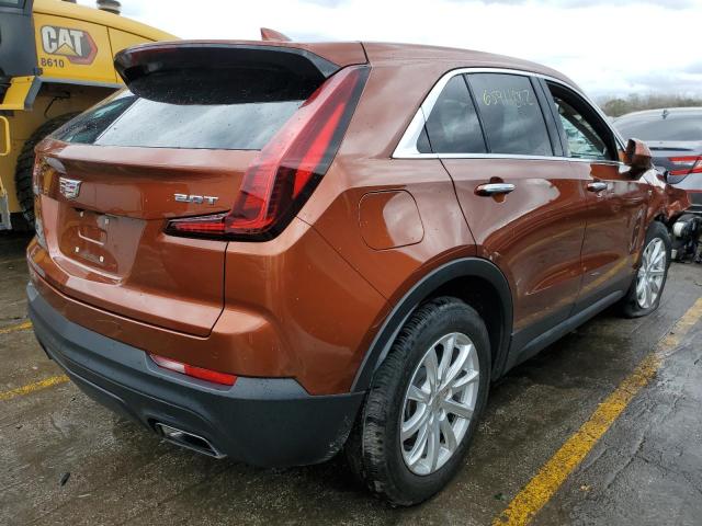 1GYAZAR43KF119905 - 2019 CADILLAC XT4 LUXURY ORANGE photo 4