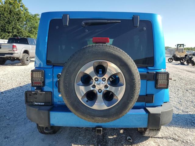 1C4BJWEG4GL301264 - 2016 JEEP WRANGLER U SAHARA BLUE photo 6