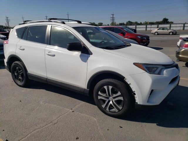 JTMBFREV4JJ240275 - 2018 TOYOTA RAV4 LE WHITE photo 4