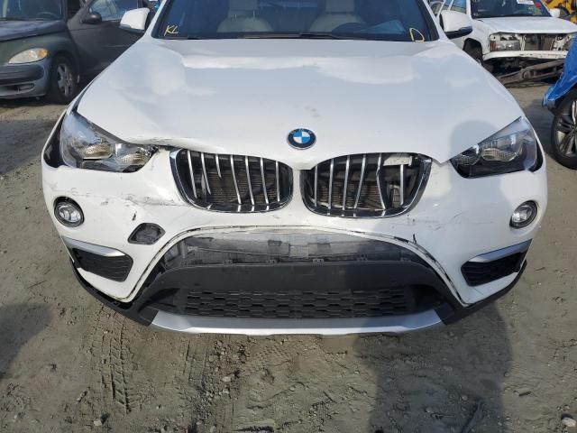 WBXHU7C38H5H36694 - 2017 BMW X1 SDRIVE28I WHITE photo 9