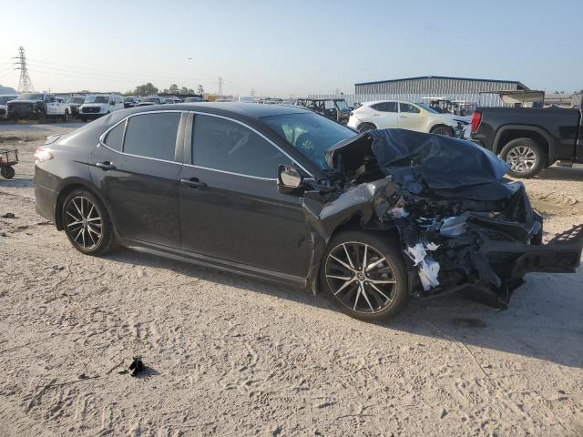 4T1G11AK6PU787553 - 2023 TOYOTA CAMRY SE NIGHT SHADE BLACK photo 4