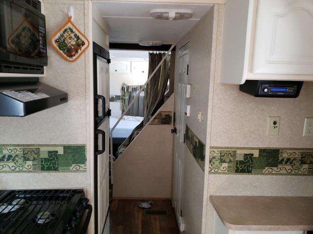 4YDT27L269B450750 - 2009 OUTB TRAVEL TRL WHITE photo 6