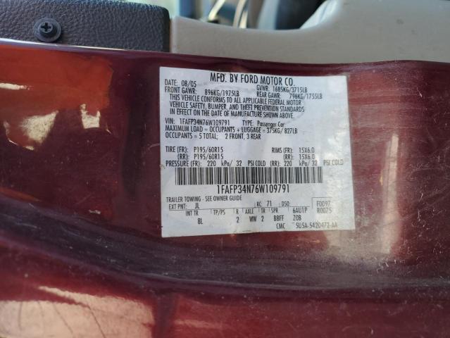 1FAFP34N76W109791 - 2006 FORD FOCUS ZX4 MAROON photo 13