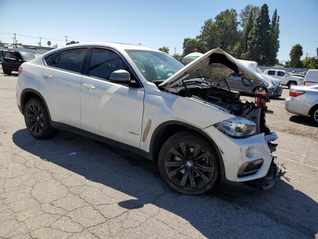 5UXKU2C50K0Z65720 - 2019 BMW X6 XDRIVE35I WHITE photo 4