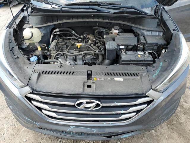 KM8J2CA48JU681399 - 2018 HYUNDAI TUCSON SE BLUE photo 12