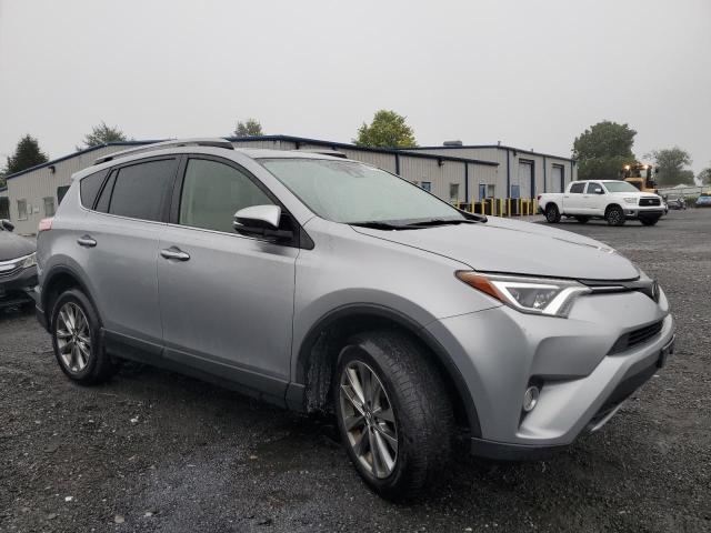 JTMDFREV4JD238968 - 2018 TOYOTA RAV4 LIMITED SILVER photo 4