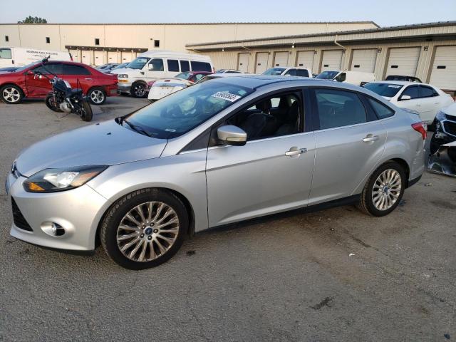 1FAHP3J21CL277877 - 2012 FORD FOCUS TITANIUM SILVER photo 1