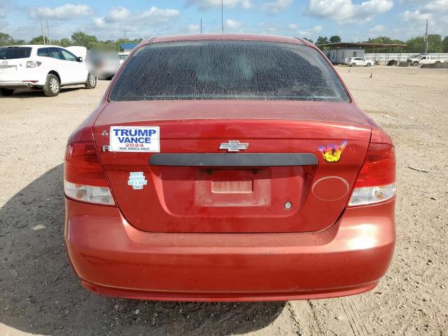 KL1TD56686B623669 - 2006 CHEVROLET AVEO BASE Czerwony zdjęcie 6