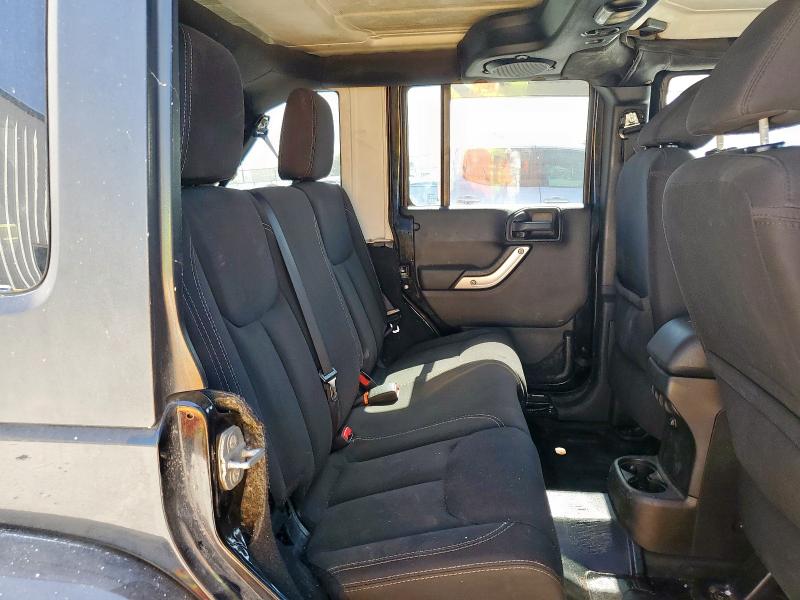 1C4BJWEG1EL258760 - 2014 JEEP WRANGLER U SAHARA BLACK photo 11