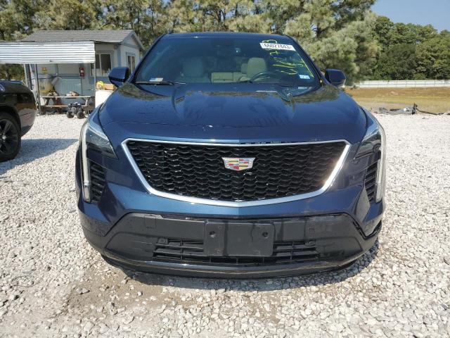 1GYFZER43KF228863 - 2019 CADILLAC XT4 SPORT BLUE photo 5