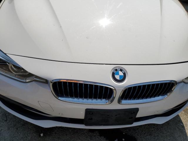 WBA8E1C53JA762796 - 2018 BMW 330E WHITE photo 11