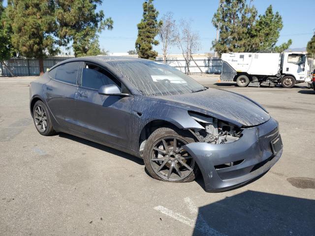 5YJ3E1EA9PF413407 - 2023 TESLA MODEL 3 ნაცრისფერი ფოტო 4