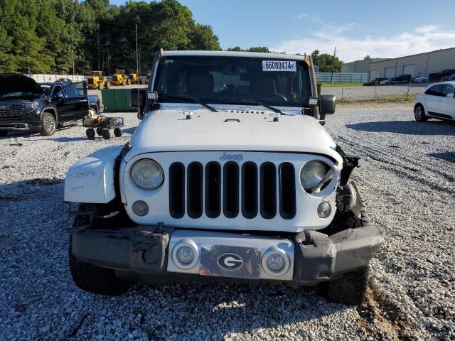 1C4BJWEG7EL209336 - 2014 JEEP WRANGLER U SAHARA WHITE photo 5