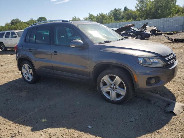 WVGJV3AX4EW538526 - 2014 VOLKSWAGEN TIGUAN S CHARCOAL photo 4
