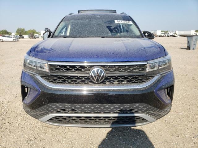 3VVEX7B25PM357773 - 2023 VOLKSWAGEN TAOS SE BLUE photo 5