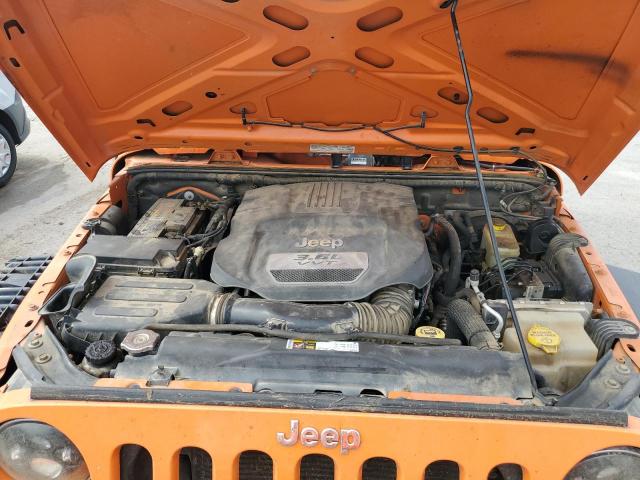 1C4HJWDG3DL559475 - 2013 JEEP WRANGLER U SPORT ORANGE photo 11