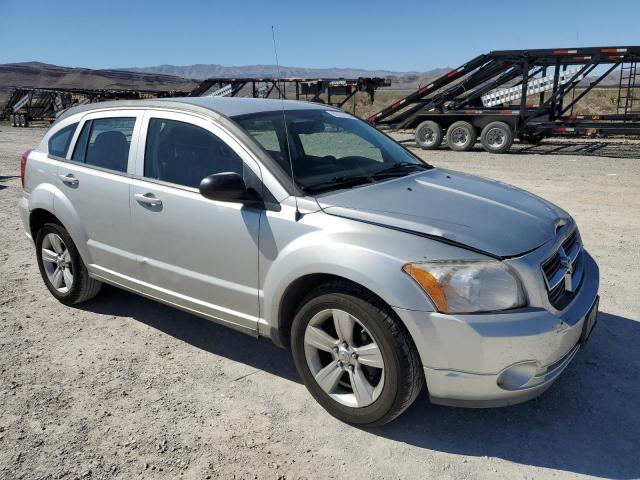 1B3CB3HA2BD296139 - 2011 DODGE CALIBER MAINSTREET SILVER photo 4