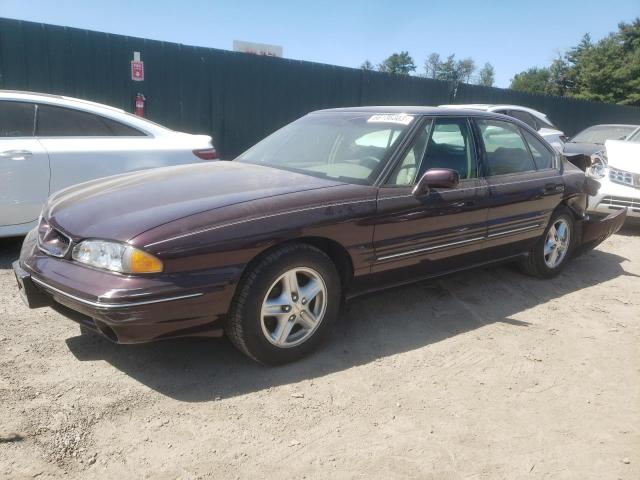 1G2HX52KXVH255567 - 1997 PONTIAC BONNEVILLE SE MAROON photo 1