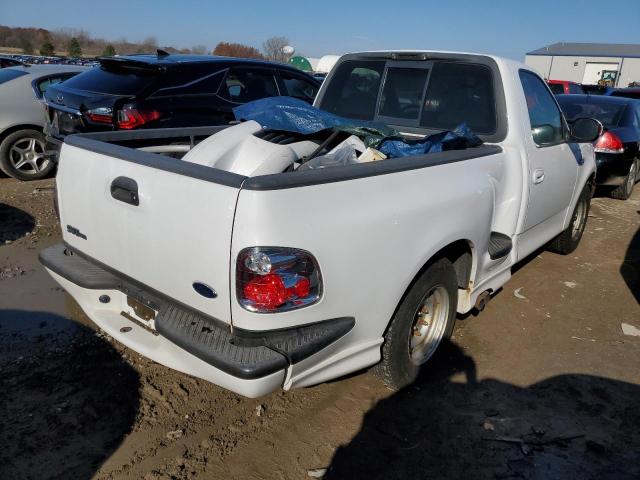 2FTZF07391CA38584 - 2001 FORD F150 SVT LIGHTNING WHITE photo 4