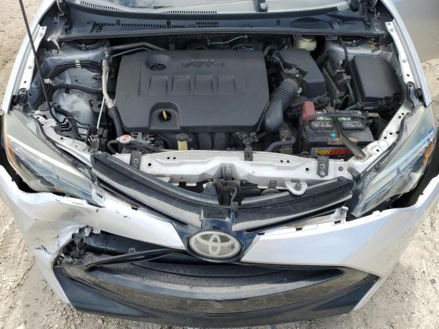 5YFBURHE3HP702395 - 2017 TOYOTA COROLLA L SILVER photo 11