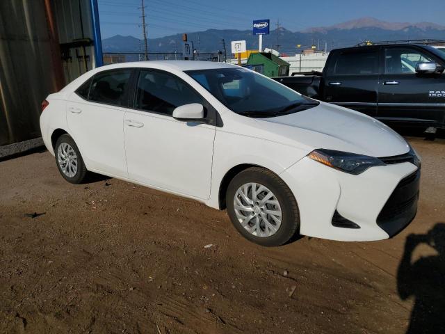 5YFBURHEXKP896625 - 2019 TOYOTA COROLLA L თეთრი ფოტო 4