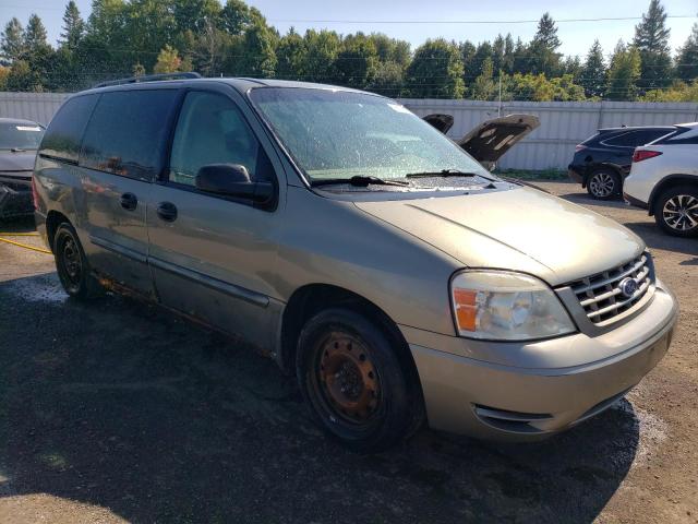 2FMZA55235BA36326 - 2005 FORD FREESTAR SE GREEN photo 4