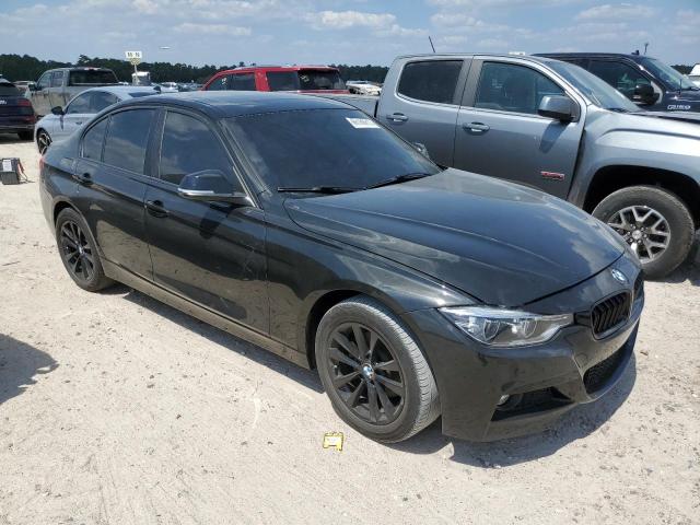 WBA8E1G59JNU92444 - 2018 BMW 320 I BLACK photo 4