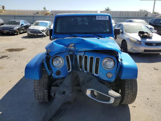 1C4AJWBG4GL147266 - 2016 JEEP WRANGLER SAHARA BLUE photo 5