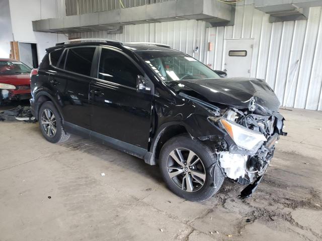 2T3RFREV1GW427711 - 2016 TOYOTA RAV4 XLE BLACK photo 4