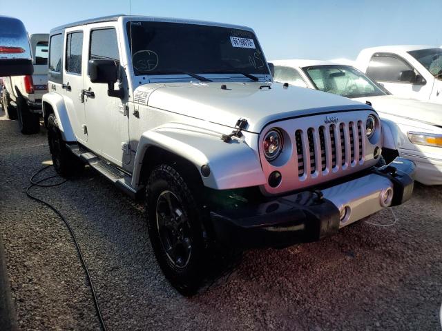 1C4BJWEG7CL228448 - 2012 JEEP WRANGLER U SAHARA SILVER photo 1