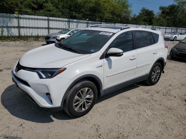 JTMRJREV7HD083945 - 2017 TOYOTA RAV4 HV LE WHITE photo 1