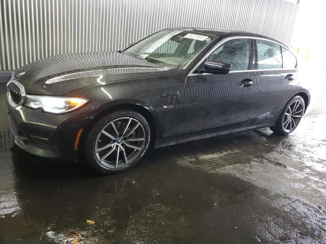 3MW5P7J06N8C62379 - 2022 BMW 330E BLACK photo 1