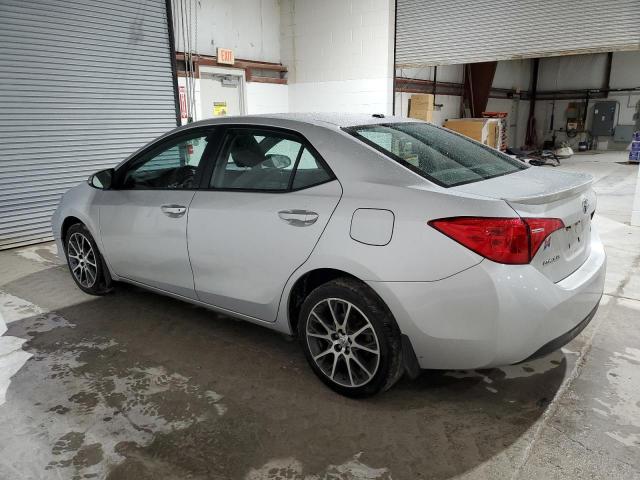 5YFBURHEXHP577900 - 2017 TOYOTA COROLLA L SILVER photo 2