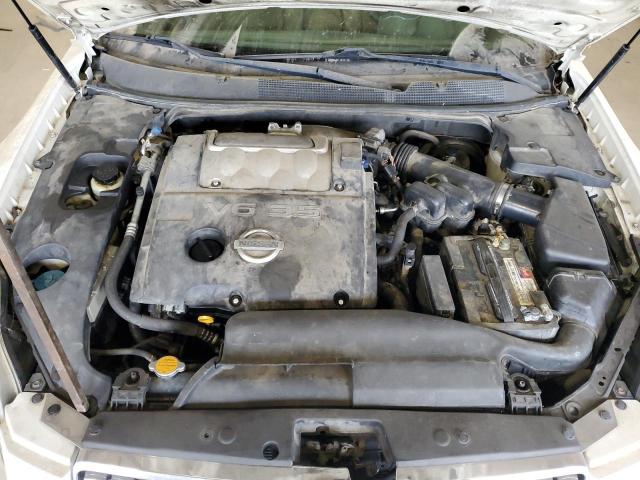 1N4BA41E34C870164 - 2004 NISSAN MAXIMA SE WHITE photo 11