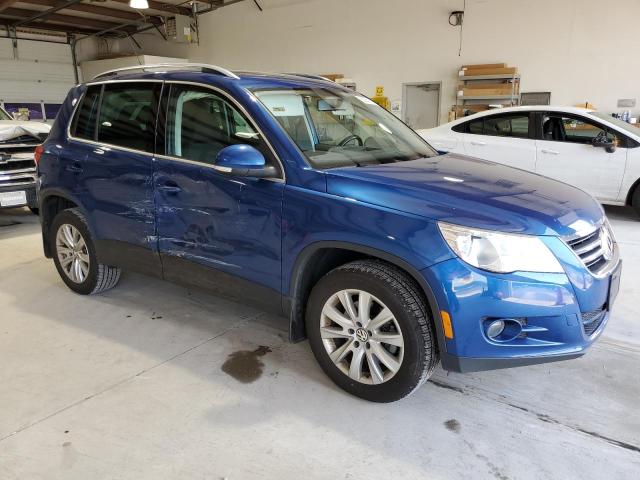 WVGAV75N59W525502 - 2009 VOLKSWAGEN TIGUAN S BLUE photo 4