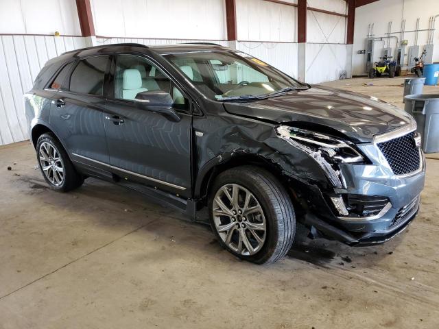 1GYKNGRS2MZ178690 - 2021 CADILLAC XT5 SPORT BLUE photo 4