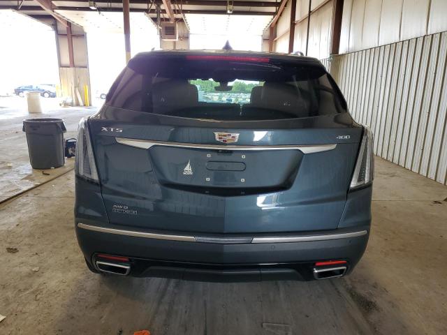 1GYKNGRS2MZ178690 - 2021 CADILLAC XT5 SPORT BLUE photo 6