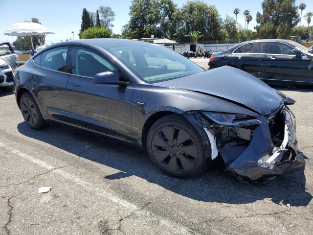 5YJ3E1EAXSF018693 - 2025 TESLA MODEL 3 BLACK photo 4
