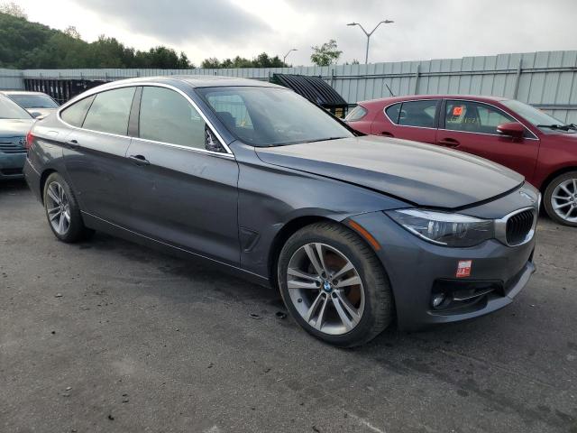 WBA8Z9C50JG828222 - 2018 BMW 330 XIGT GRAY photo 4