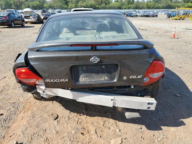 JN1CA31A31T319608 - 2001 NISSAN MAXIMA GXE BLACK photo 6