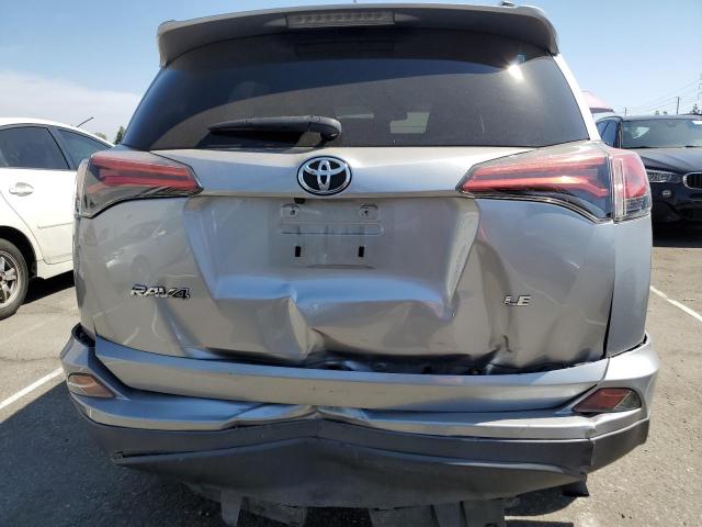 2T3ZFREV9JW415829 - 2018 TOYOTA RAV4 LE SILVER photo 6