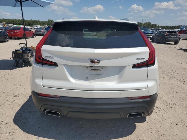 1GYAZAR41PF132823 - 2023 CADILLAC XT4 LUXURY WHITE photo 6