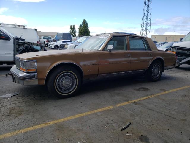 6S69R7Q456198 - 1977 CADILLAC 4D BEIGE photo 1