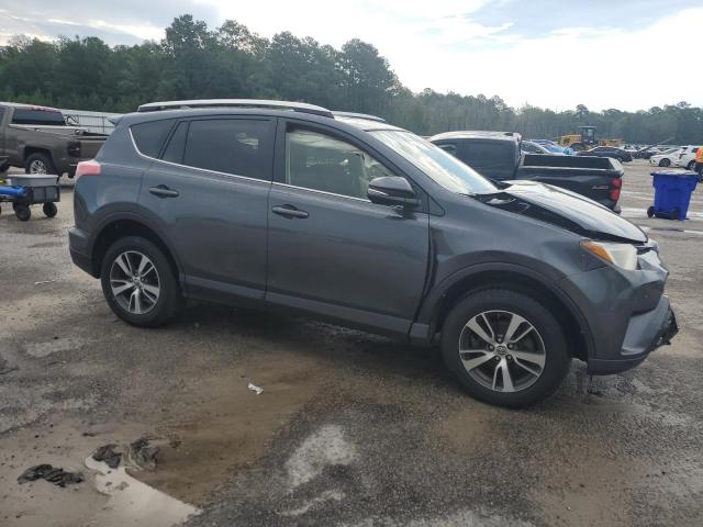 JTMWFREVXGD082310 - 2016 TOYOTA RAV4 XLE CHARCOAL photo 4