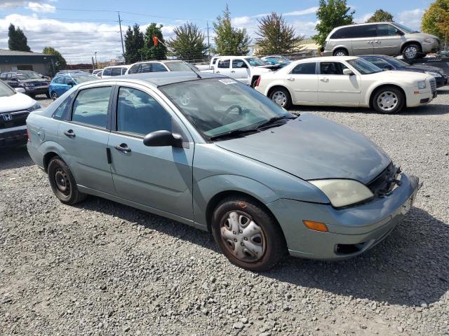 1FAHP34N15W125167 - 2005 FORD FOCUS ZX4 GREEN photo 4