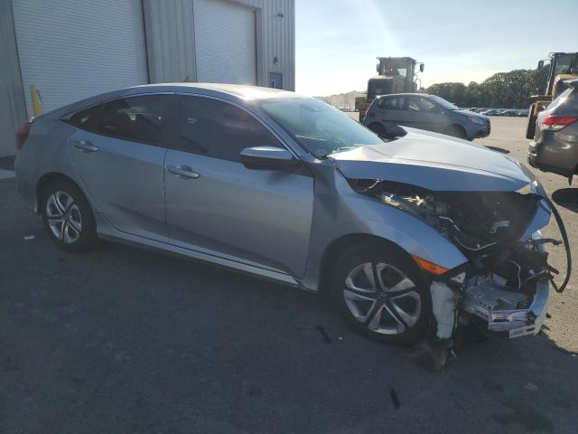 2HGFC2F69LH504895 - 2020 HONDA CIVIC LX SILVER photo 4