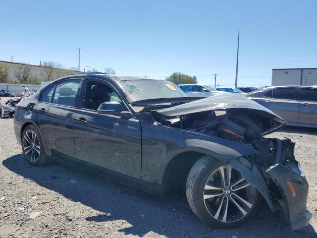 WBA8B9C57JEE82401 - 2018 BMW 330 I BLACK photo 4