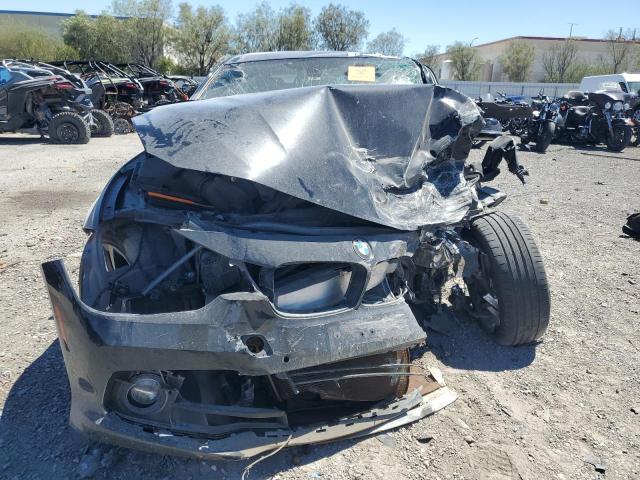 WBA8B9C57JEE82401 - 2018 BMW 330 I BLACK photo 5