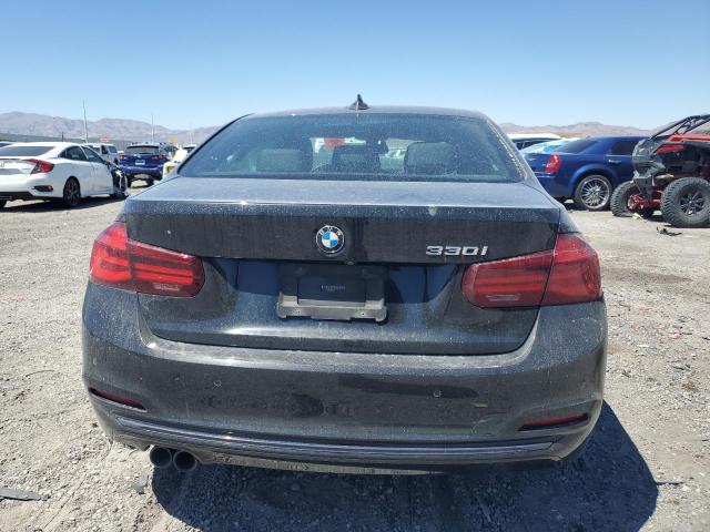 WBA8B9C57JEE82401 - 2018 BMW 330 I BLACK photo 6